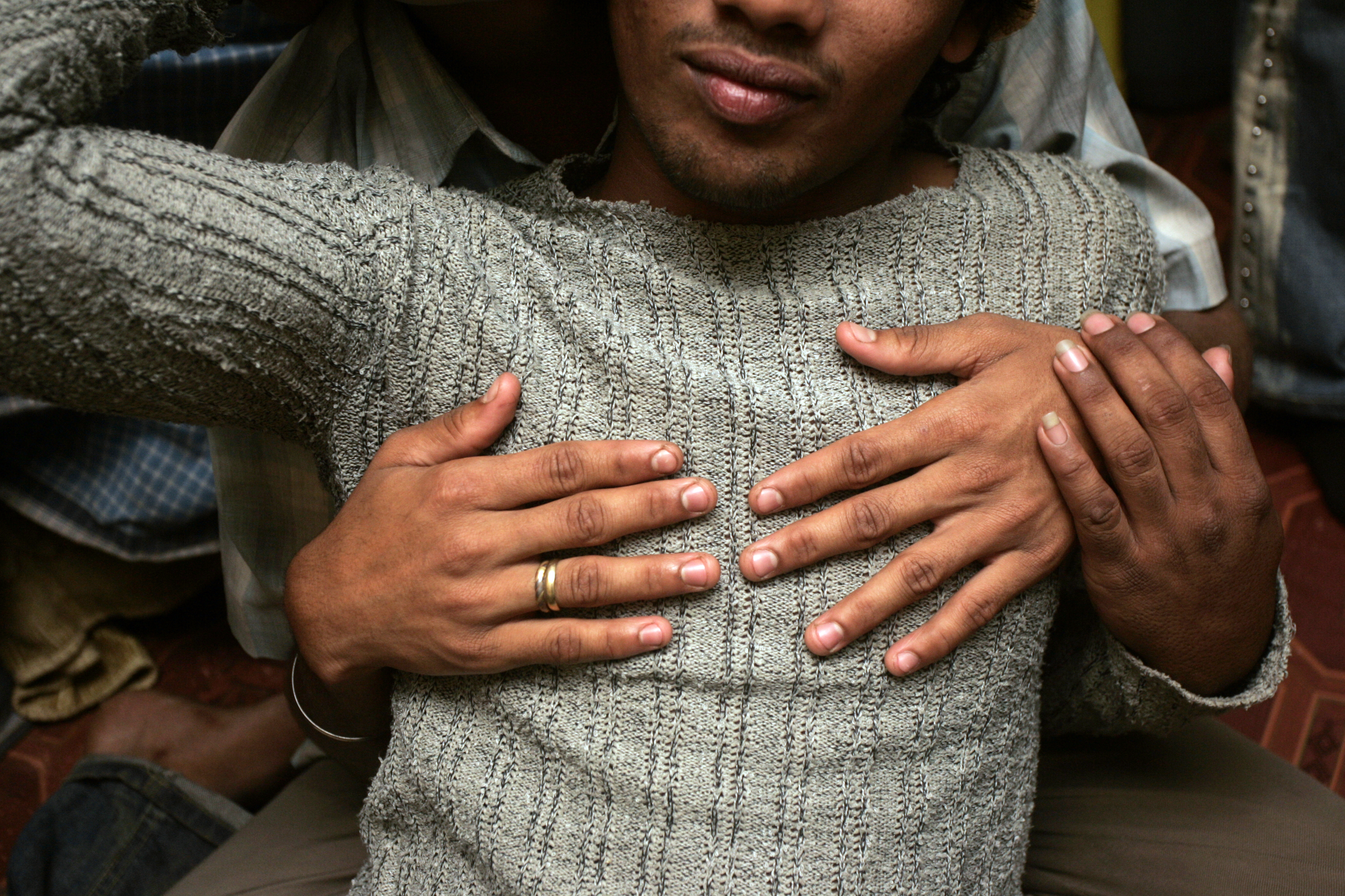 men hugging