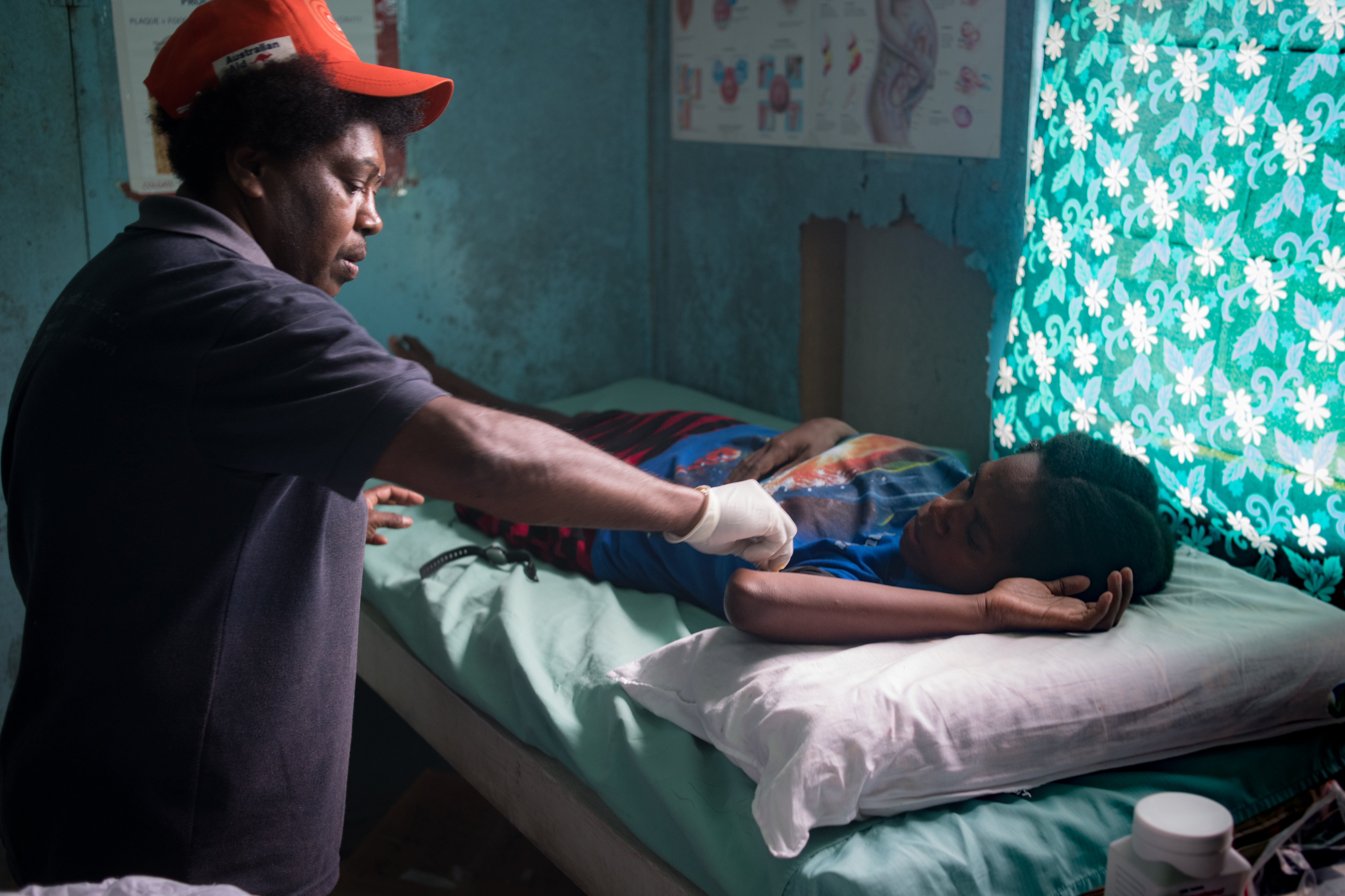 Nurse Leias Obed attending to a patient