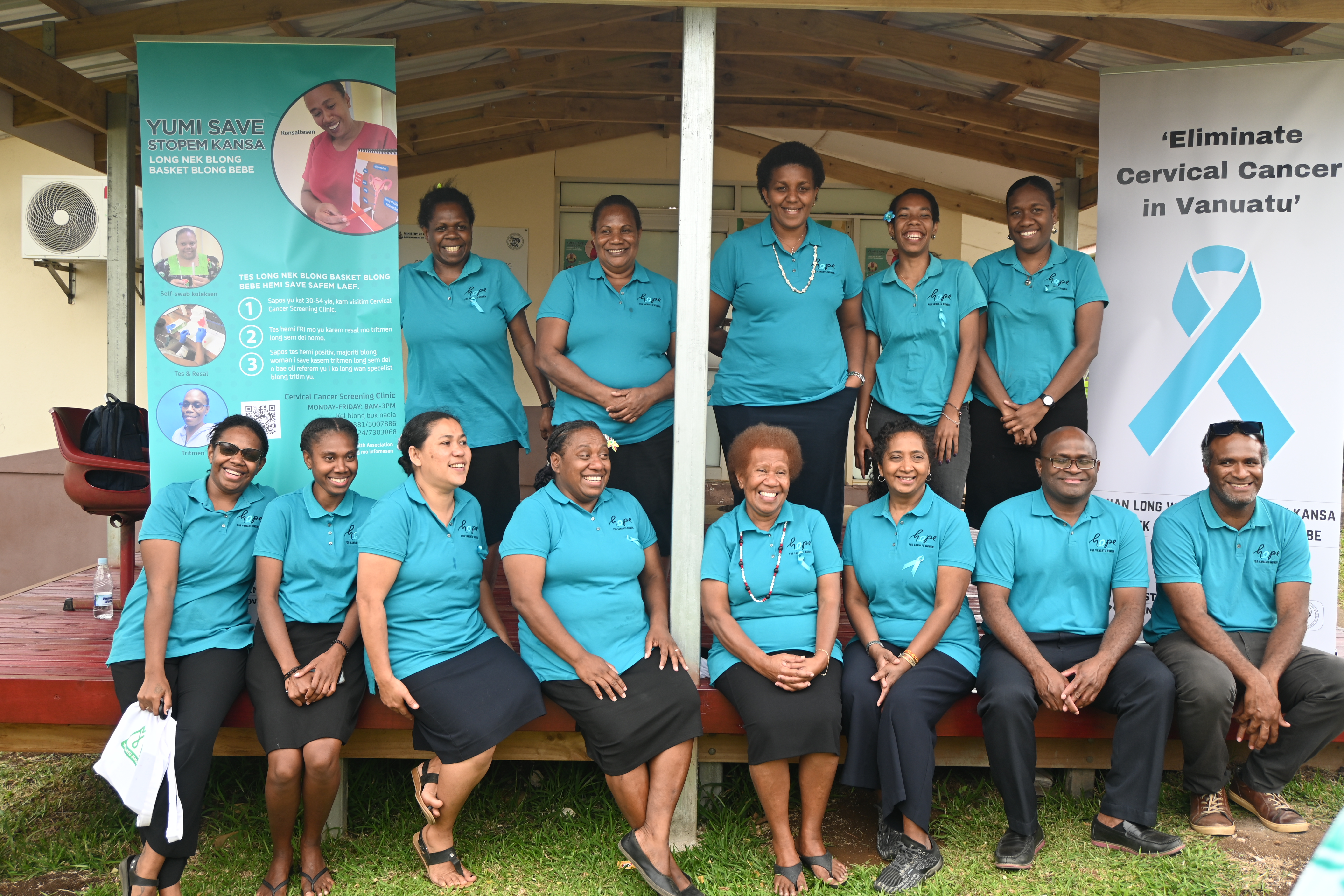 Clinic staff in front of the clinic