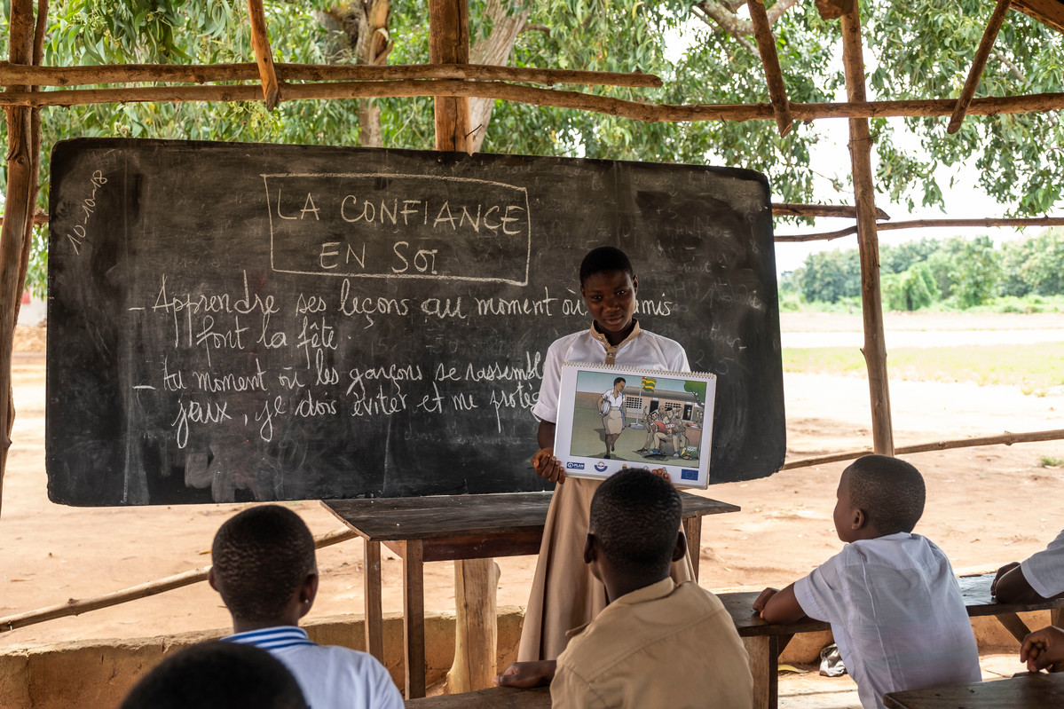 A student talks to her classmates about sexual behaviour at the CEG Tohoun school in Tohoun, Togo