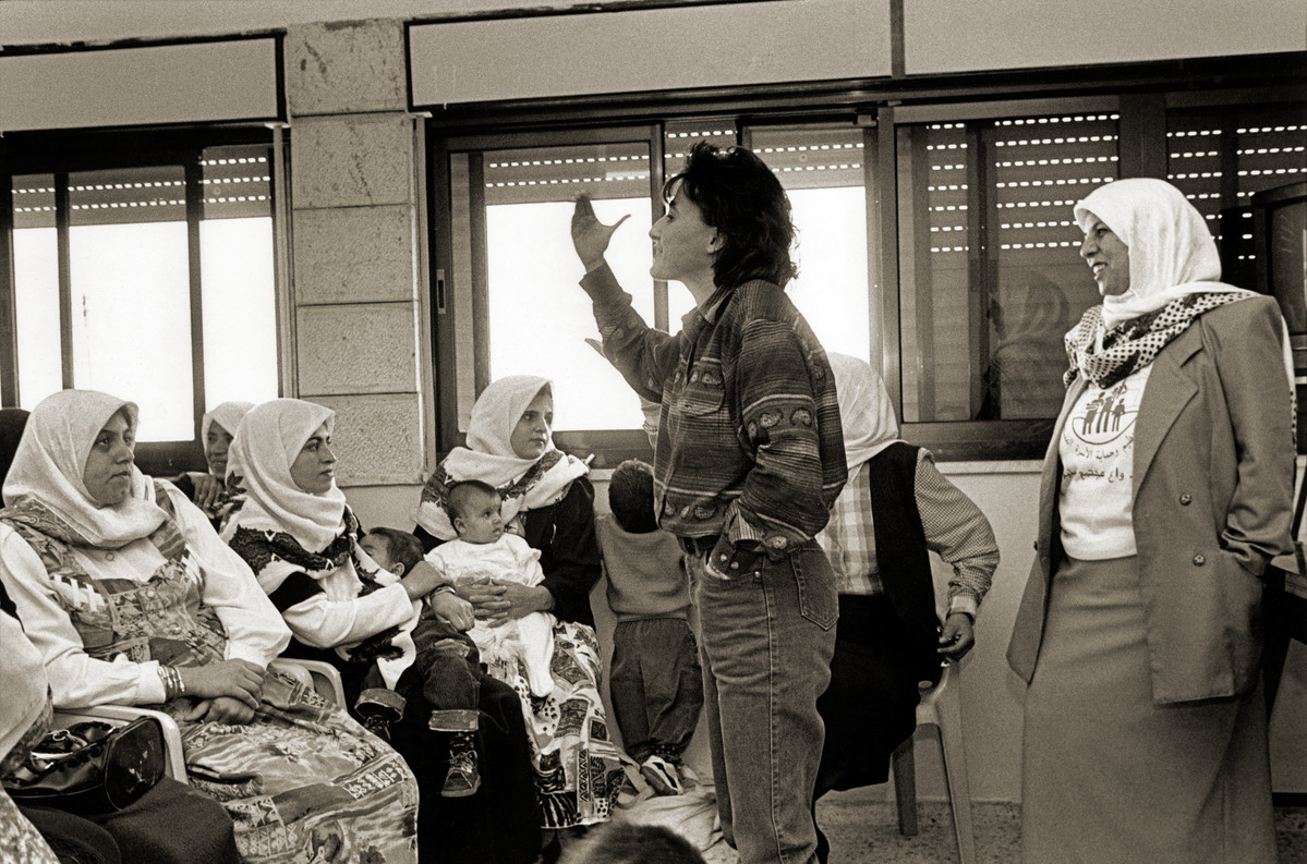 PFPPA staff at the clinic in the West Bank holding an information session on family planning. Palestine, 1995