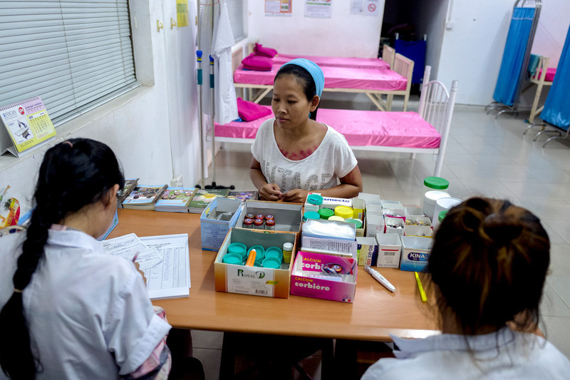 39-year-old garment worker Theary receives a consultation at the Propitious garment factory. RHAC provides training to some of the nurses working in the factories as part of their programmes, so that garment workers can seek advice during working days about reproductive health issues.  