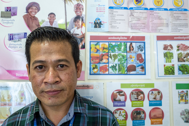 Human resources manager Vong Ratha at the Dewhirst Garment Factory library. Ratha has been working for Dewhirst for four years. He says that access to reproductive health care has had a positive impact on the workers at the factory; they have seen a considerable reduction in workers' absenteeism, which then has had a positive impact on the factory's production line.  