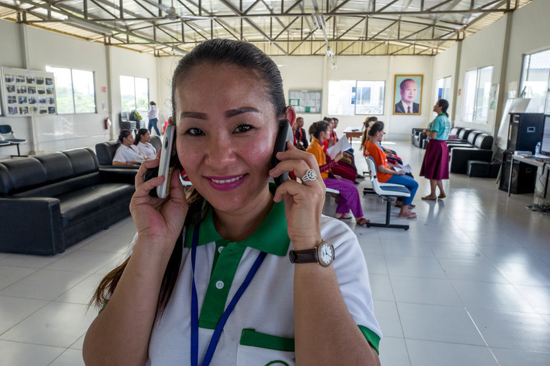 Ing Samnang's is constantly juggling mobile phones. "I take 30 calls a day on average," she says. Samnang is RHAC's only hotline counsellor. "I feel good when I help people solve their problems." 