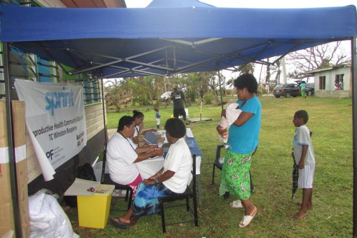 Our staff on the ground providing clients with sexual health services via mobile outreach pop-up clinics. 