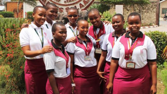 School girls with their pink box for sanitary pads