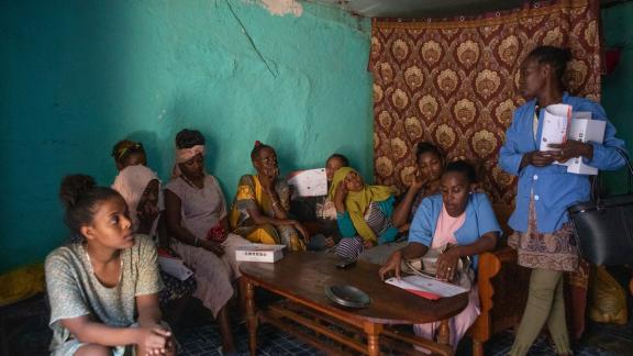 peer educators doing outreach work with sex workers providing them with information on their sexual health and contraception